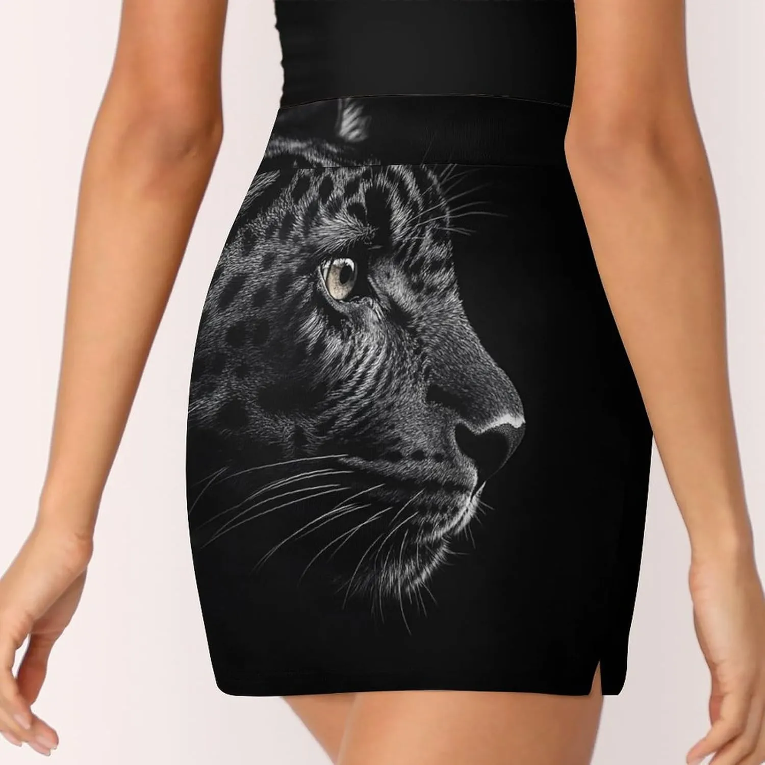 Close-up of Black Leopard Women's Mini Tennis Skirt with Shorts Underneath Athletic Workout Cute Skorts